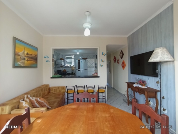 Apartamento no Balneário Stella Maris, em Peruíbe, com vista para o mar, 65 m², cozinha americana e localização privilegiada.