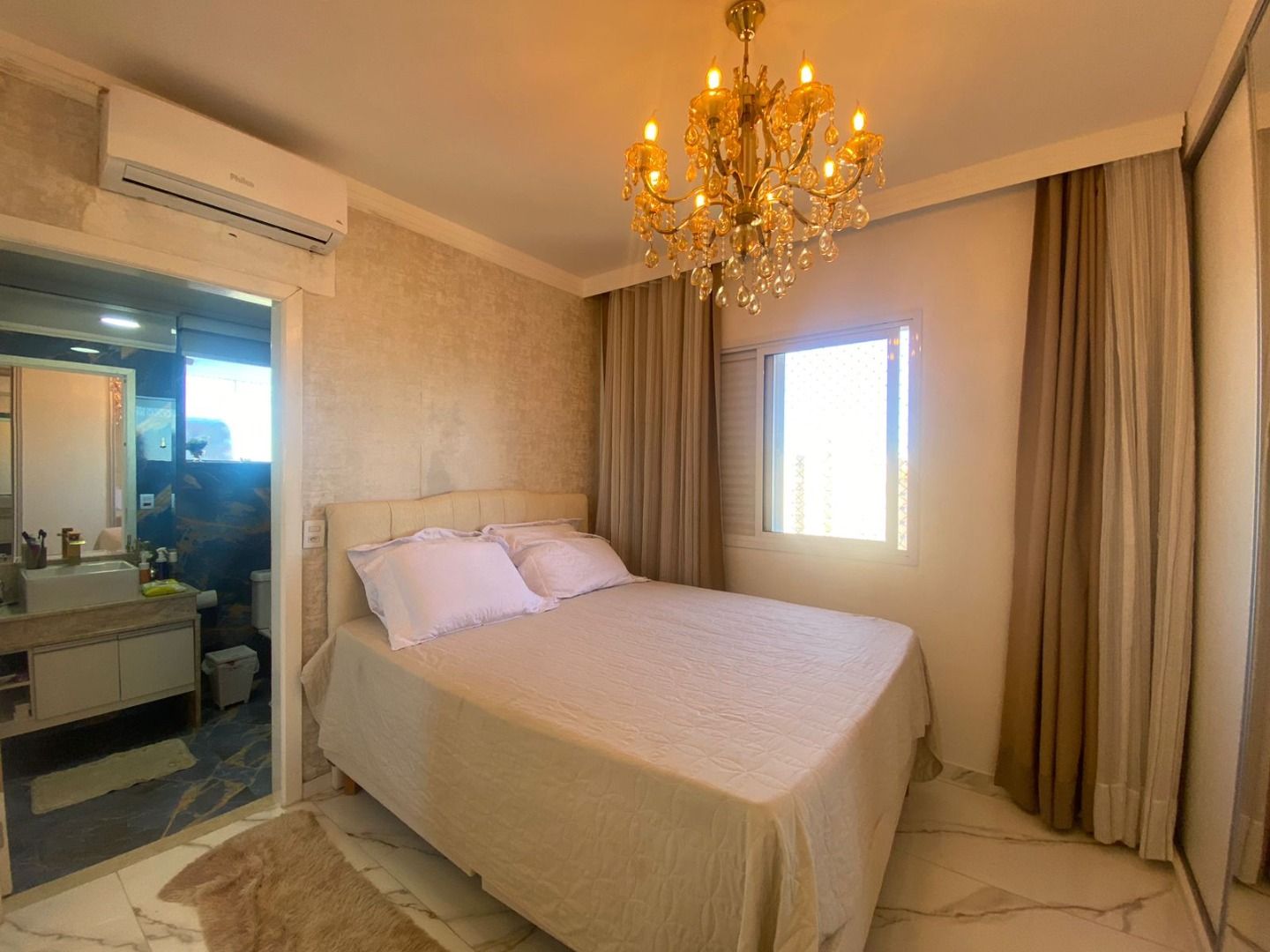 Apartamento no Centro de Peruíbe com 144 m², 3 dormitórios, varanda gourmet com vista para o mar e alto padrão.