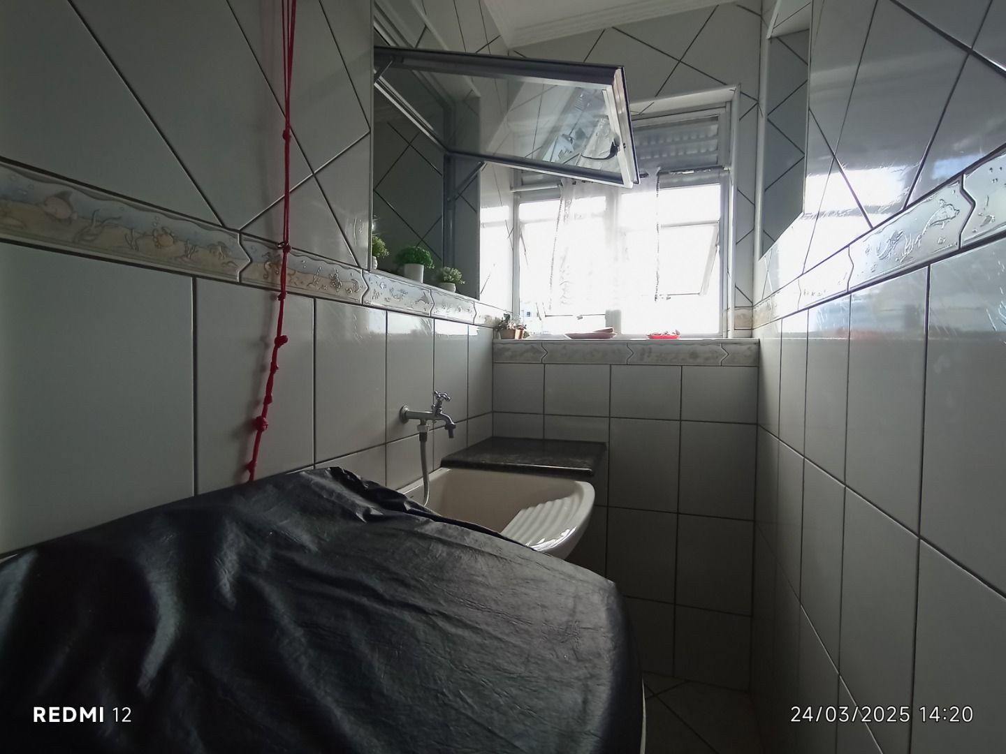 Apartamento no Balneário Stella Maris, em Peruíbe, com vista para o mar, 65 m², cozinha americana e localização privilegiada.